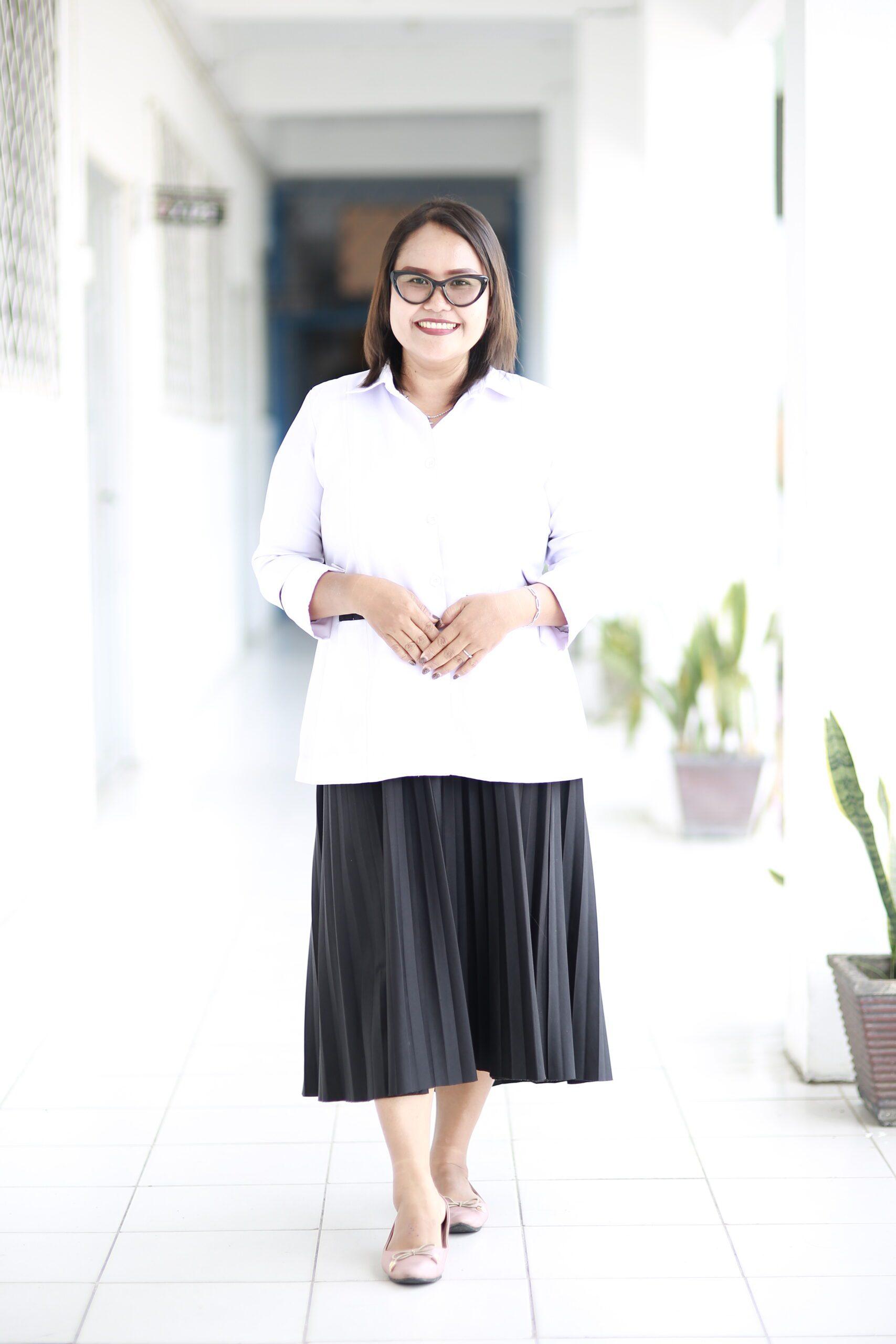 Nora Elvina Simatupang, S.Th