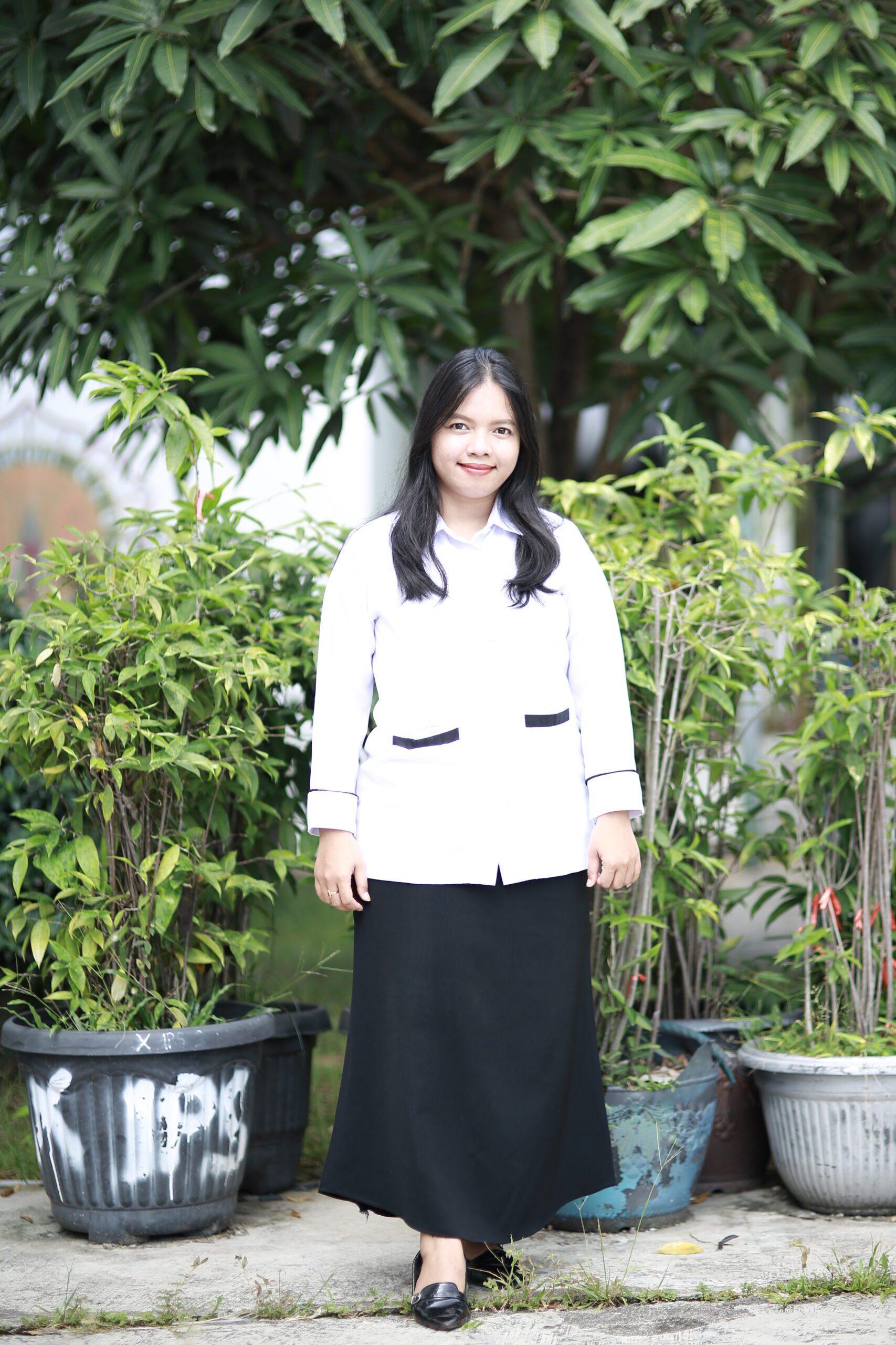 Desy Kristin Harida Tampubolon, S.Pd